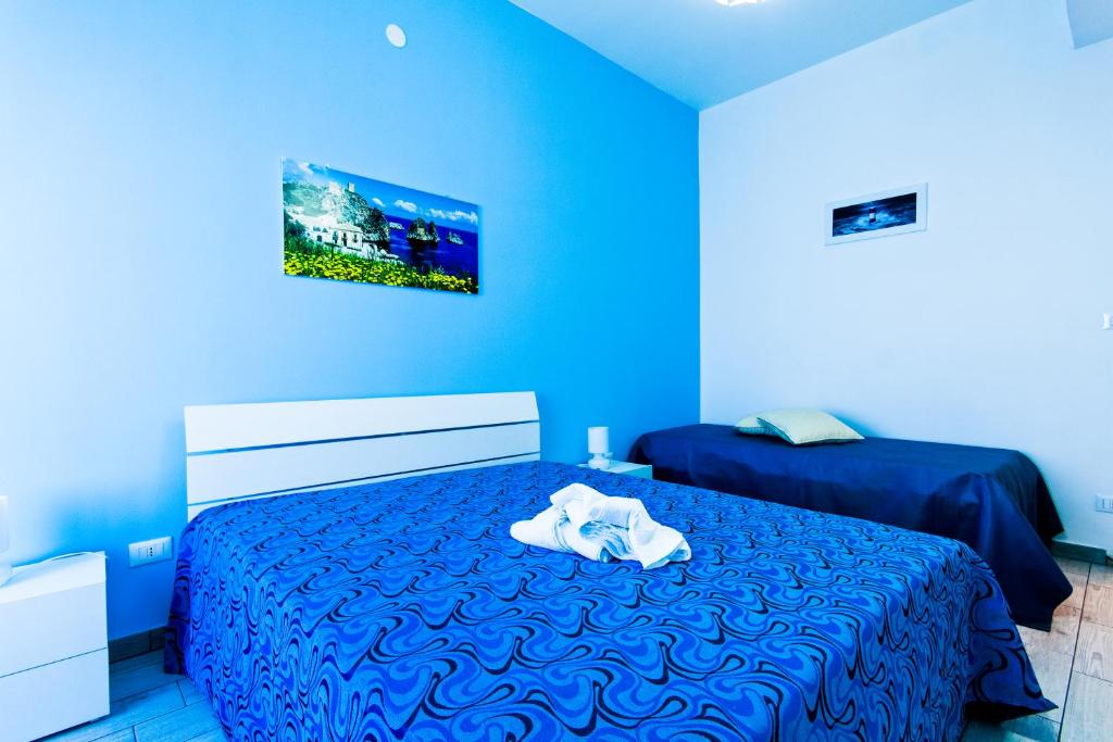 Postel nebo postele na pokoji v ubytování B&B A Mare
