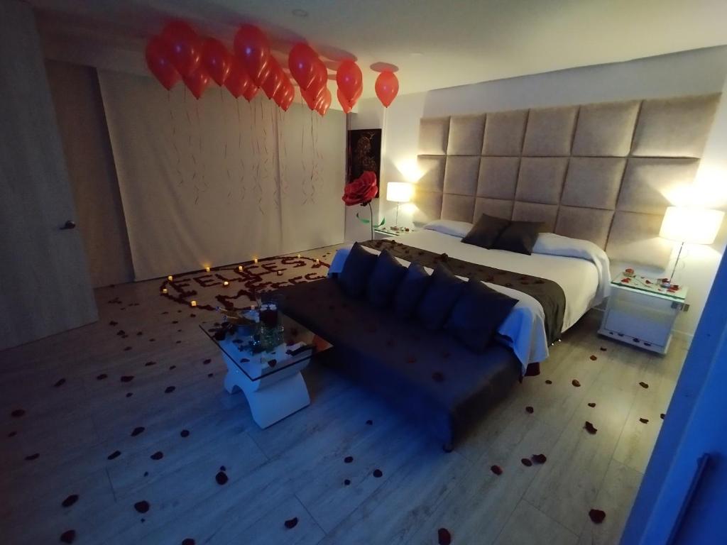 Postel nebo postele na pokoji v ubytování Mirador samsara Suite Luxury piso completo