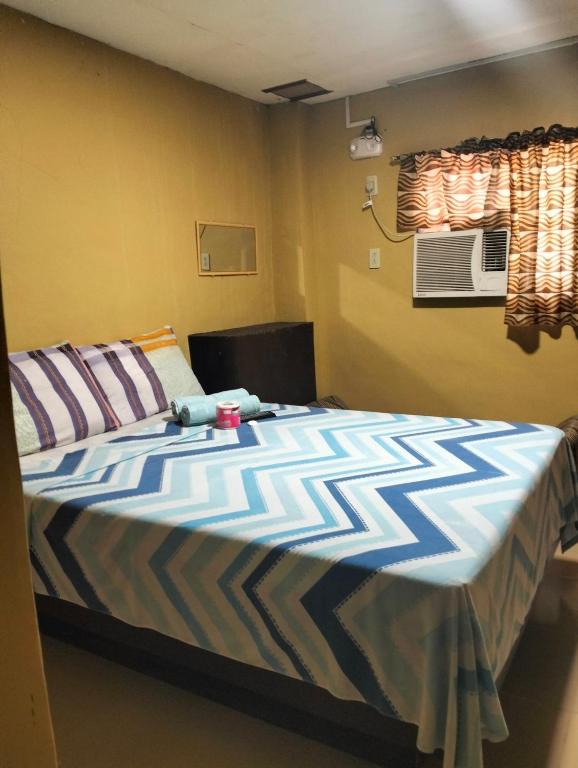 Postel nebo postele na pokoji v ubytování Don Pedro Hotel
