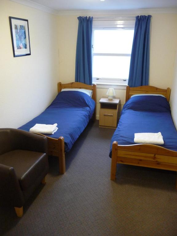 Voodi või voodid majutusasutuse Ullapool Youth Hostel toas