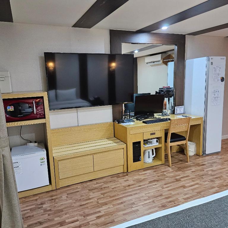 Kuchyň nebo kuchyňský kout v ubytování Amour Hotel