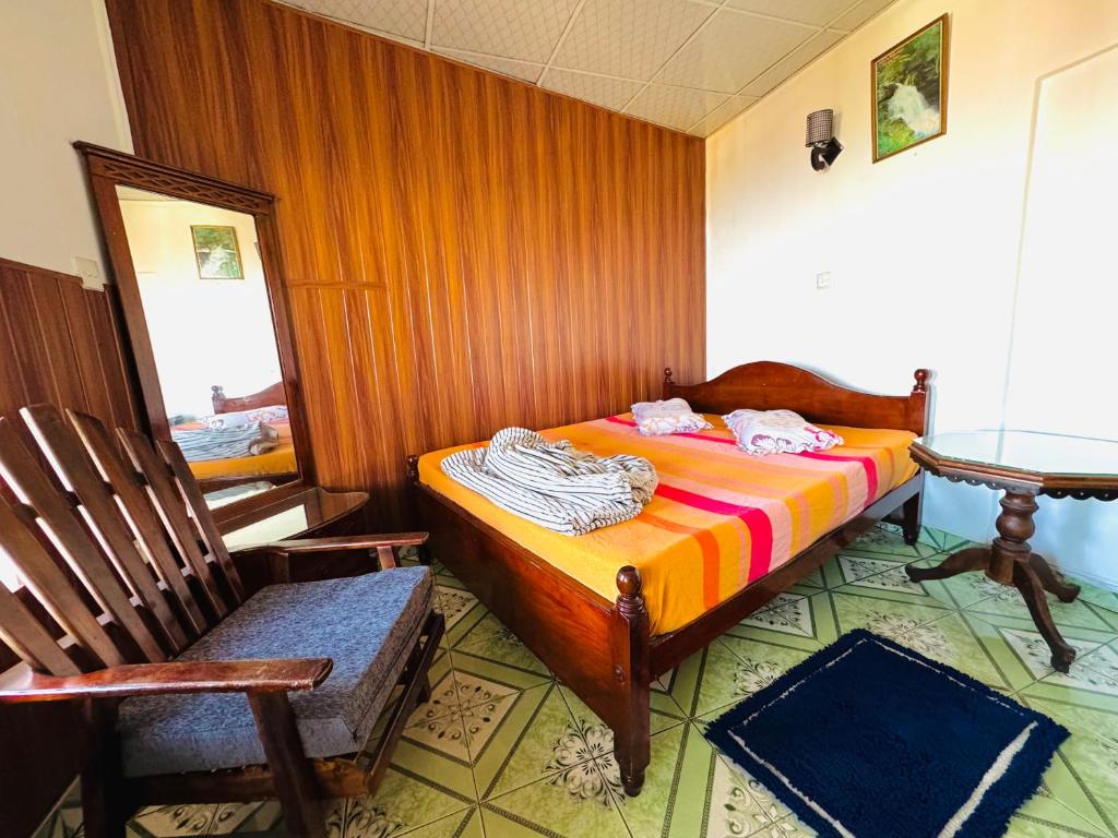 Postel nebo postele na pokoji v ubytování Lakshan View Resort