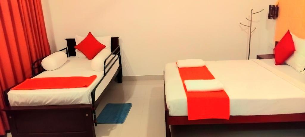 Postel nebo postele na pokoji v ubytování Regent Residencies - Colombo