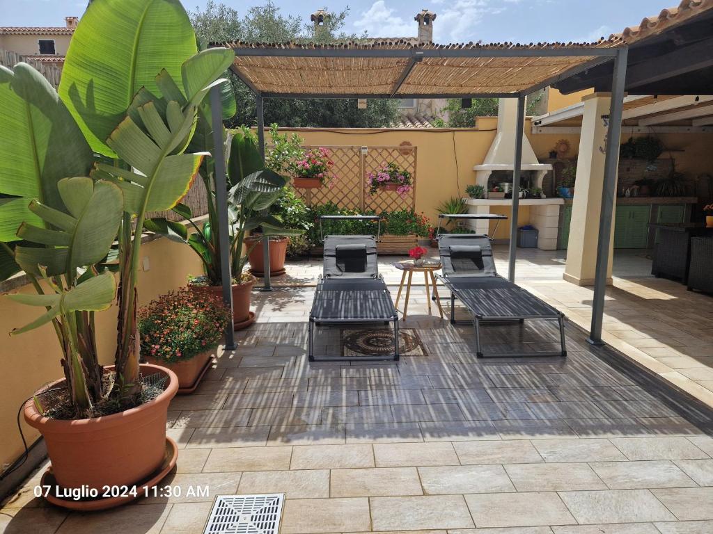 Patio alebo iná vonkajšia časť ubytovania Villa Kate Pula Sardegna