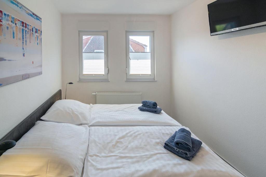 Postel nebo postele na pokoji v ubytování Ferienwohnung Charisma