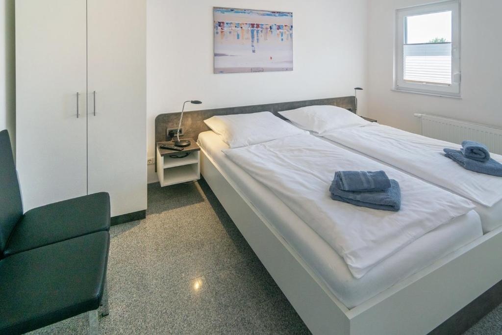 Postel nebo postele na pokoji v ubytování Ferienwohnung Charisma