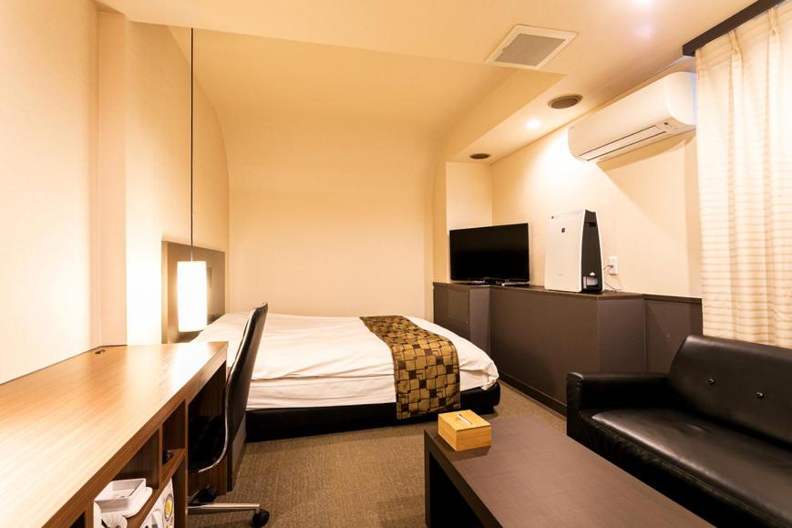 TV a/nebo společenská místnost v ubytování Hotel Double Funabashi