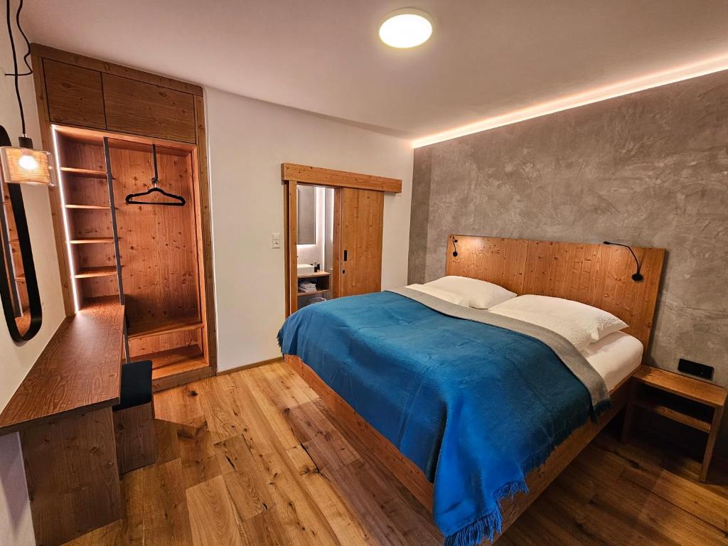 Postel nebo postele na pokoji v ubytování appartementsKOFLER