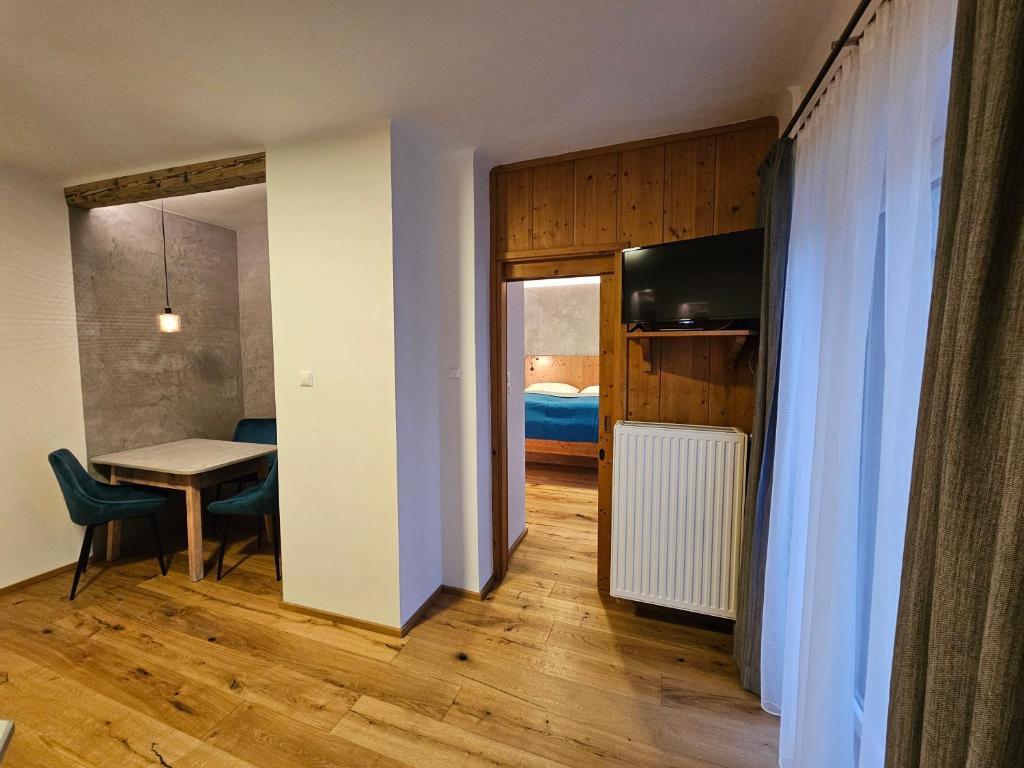 TV a/nebo společenská místnost v ubytování appartementsKOFLER