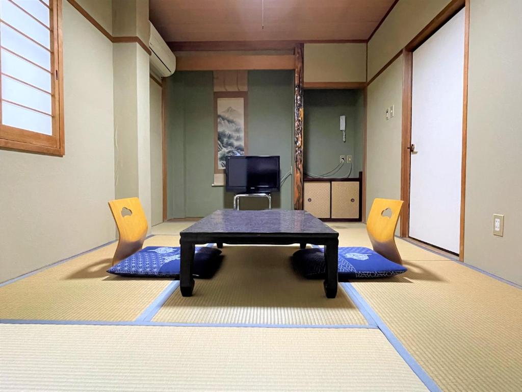 TV a/nebo společenská místnost v ubytování Dochu Land Shin Onsen