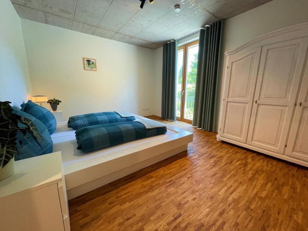 Postel nebo postele na pokoji v ubytování Ferienwohnung Grüner Ausblick