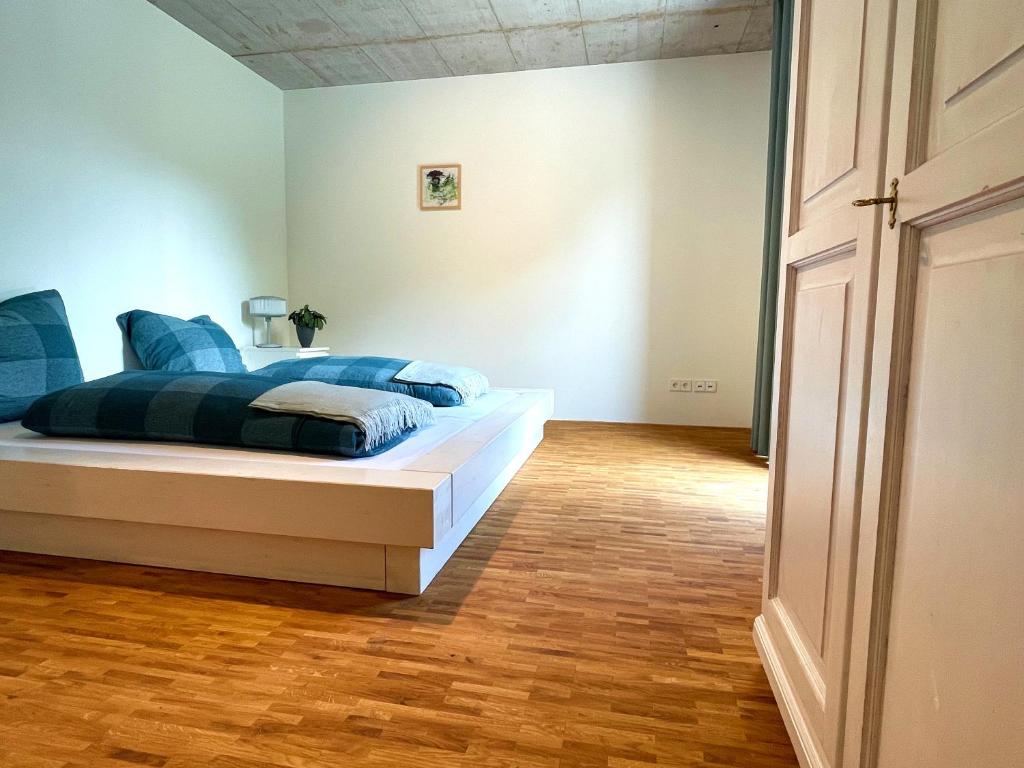 Postel nebo postele na pokoji v ubytování Ferienwohnung Grüner Ausblick