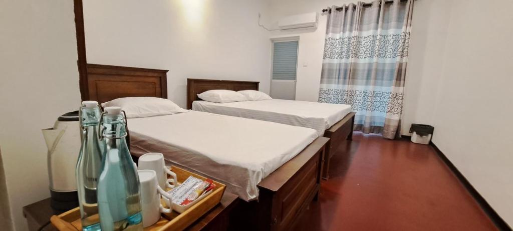 Postel nebo postele na pokoji v ubytování Aurelle Villa