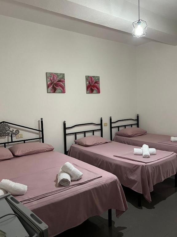 Postel nebo postele na pokoji v ubytování Guest House L&B