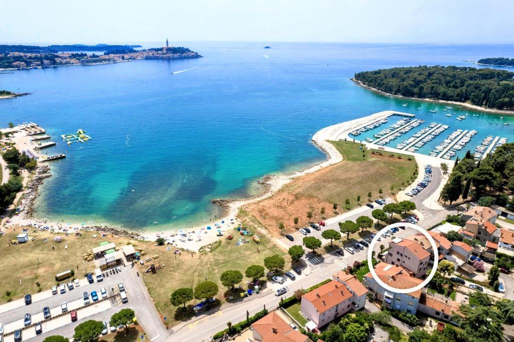 an aerial view of a beach and a body of water at Blu infinito Apartment&studios in Rovinj