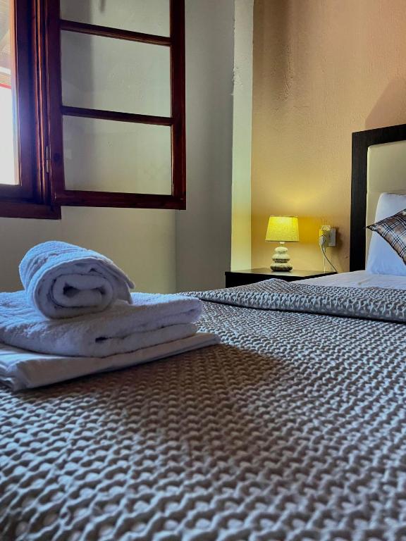 Postel nebo postele na pokoji v ubytování Anna Dani Apartments