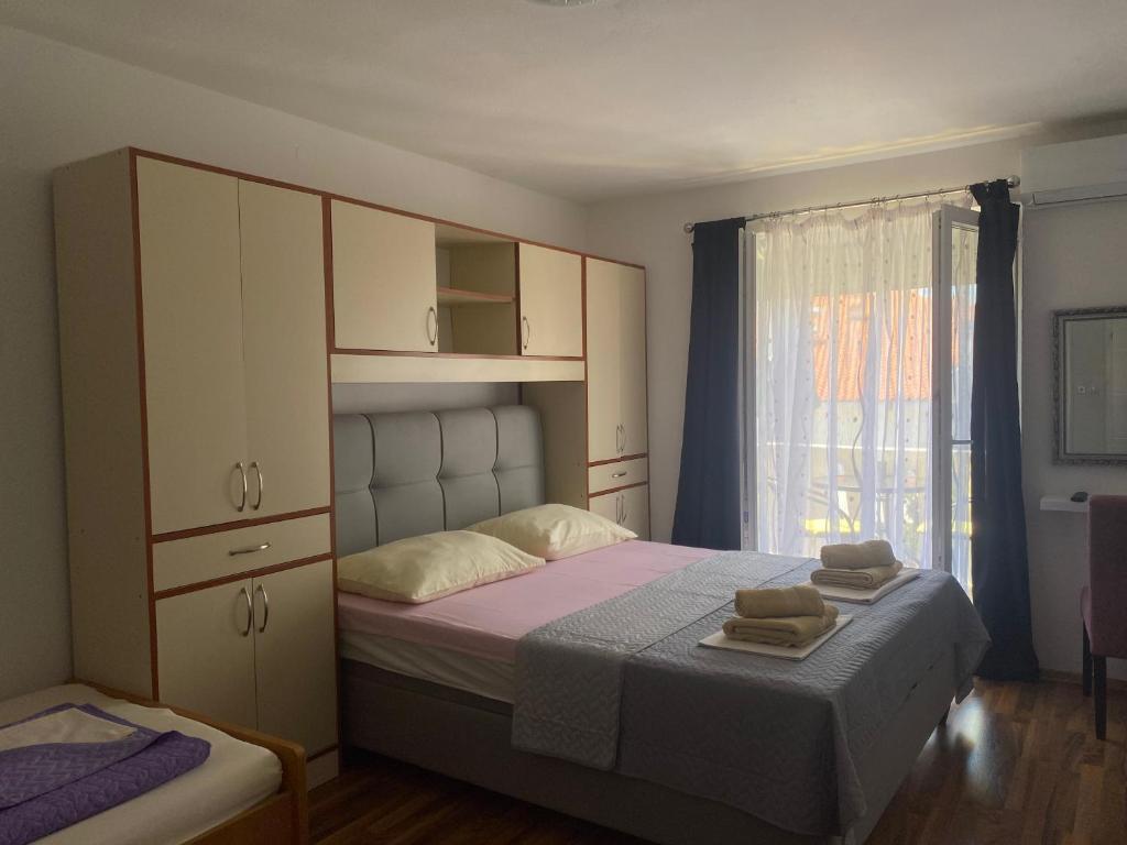 Postel nebo postele na pokoji v ubytování Villa Sekki