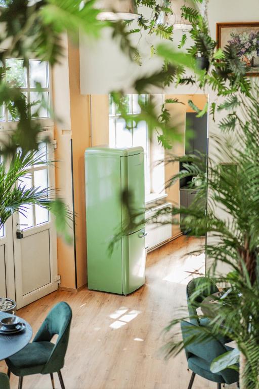 Kuchyň nebo kuchyňský kout v ubytování GREEN Apartments