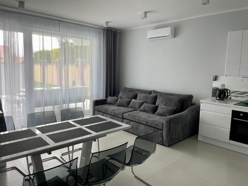 Posedenie v ubytovaní Apartamenty AQUA MAZURY
