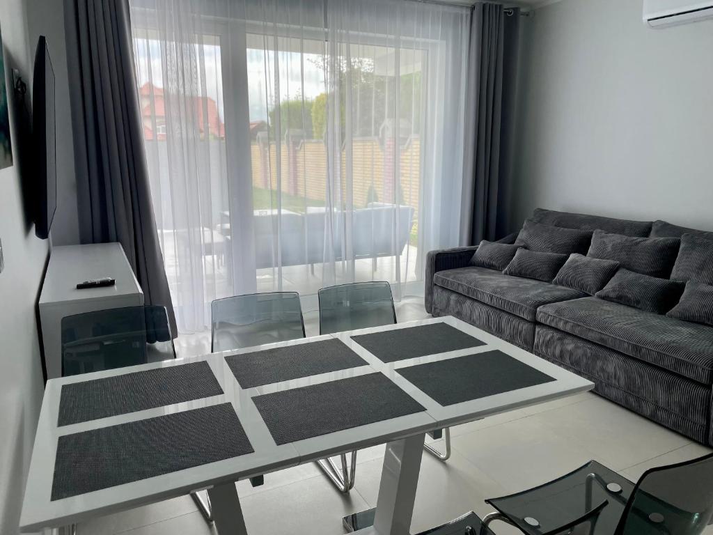 Posedenie v ubytovaní Apartamenty AQUA MAZURY