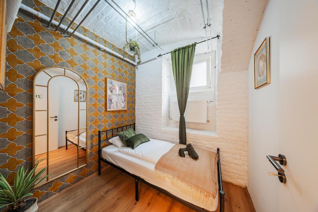 Postel nebo postele na pokoji v ubytování GREEN Apartments