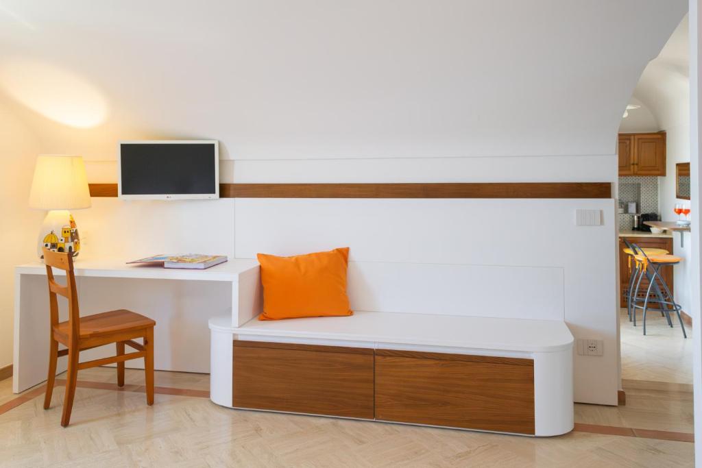 TV a/nebo společenská místnost v ubytování Residence Lì Galli
