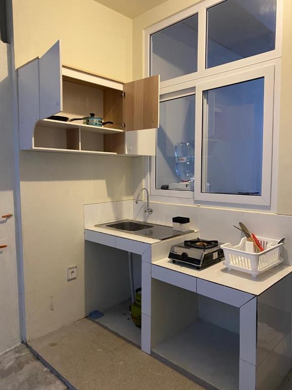 Kuchyň nebo kuchyňský kout v ubytování Villa Ku Villa Mu