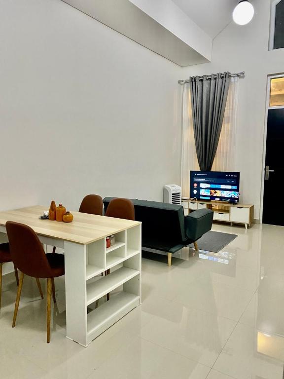 TV a/nebo společenská místnost v ubytování Villa Ku Villa Mu