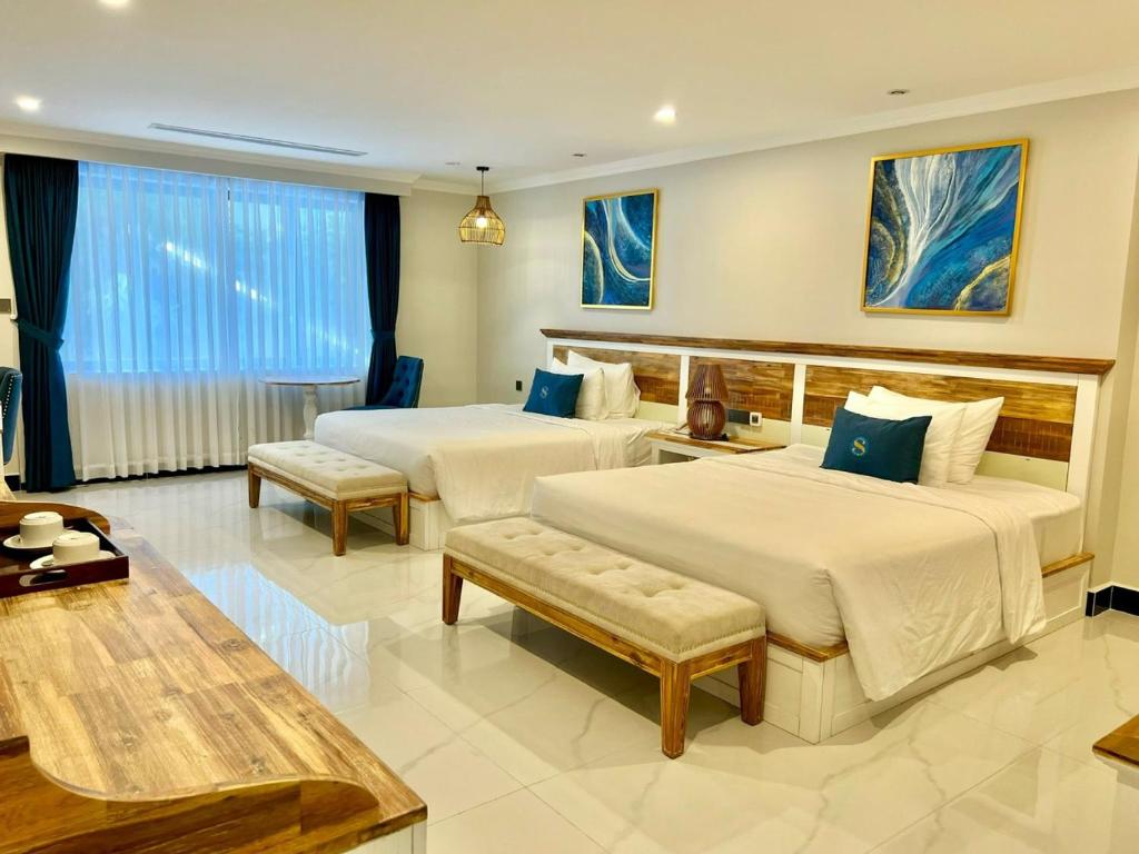 Postel nebo postele na pokoji v ubytování Sabina Luxury Boutique Hotel & Villa