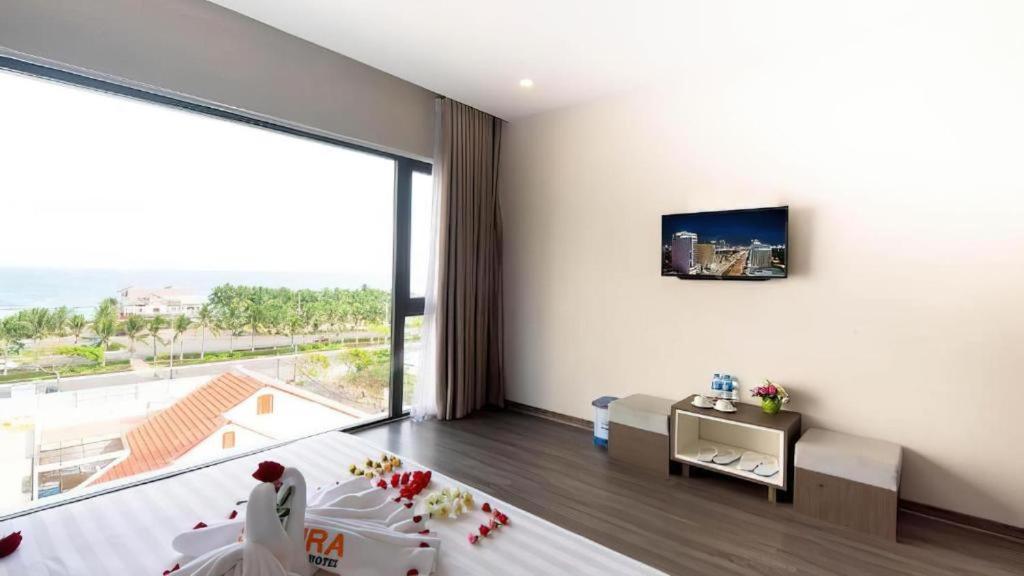 TV a/nebo společenská místnost v ubytování The Shann Hotel Danang