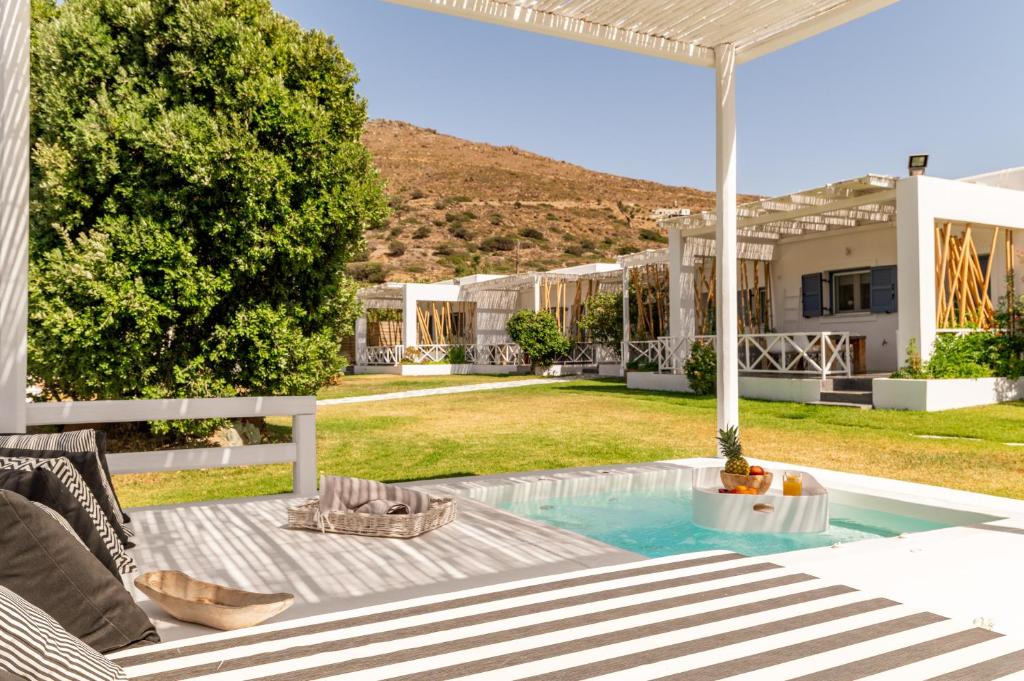 a view of the backyard of a house at Ow Andros Suite 1,Private Whirlpool in Andros