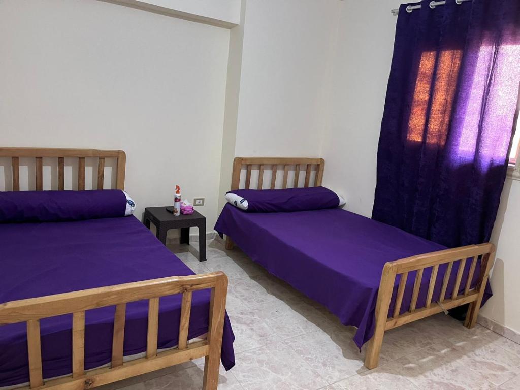 Postel nebo postele na pokoji v ubytování Taher Cairo hostel