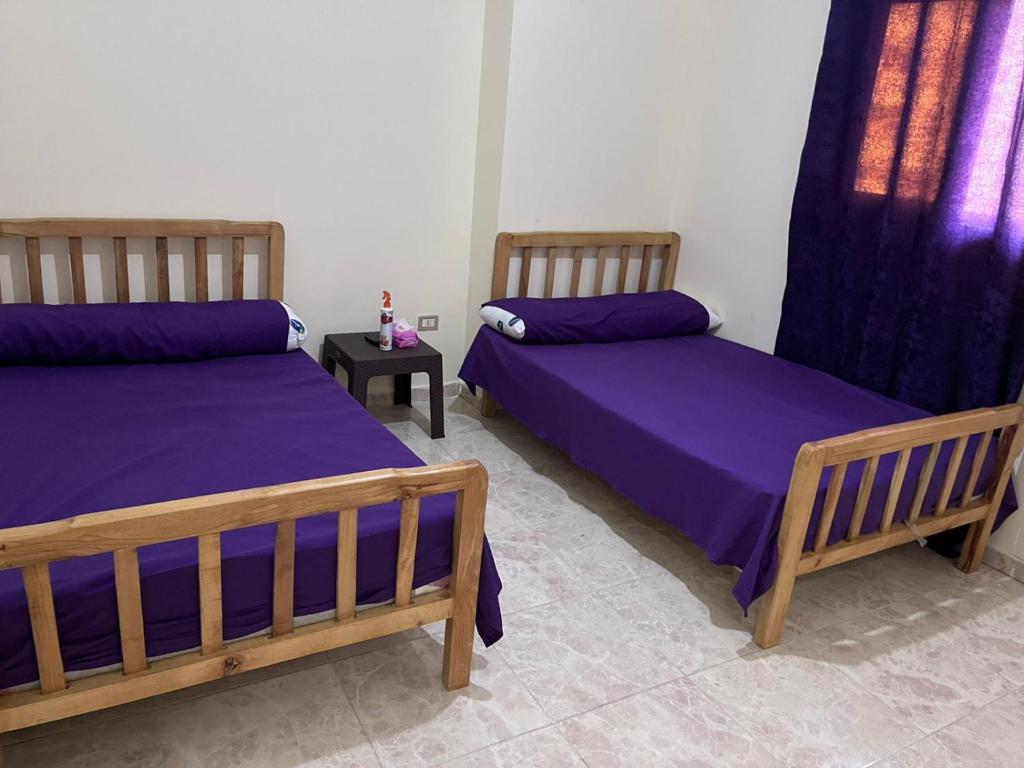 Postel nebo postele na pokoji v ubytování Taher Cairo hostel