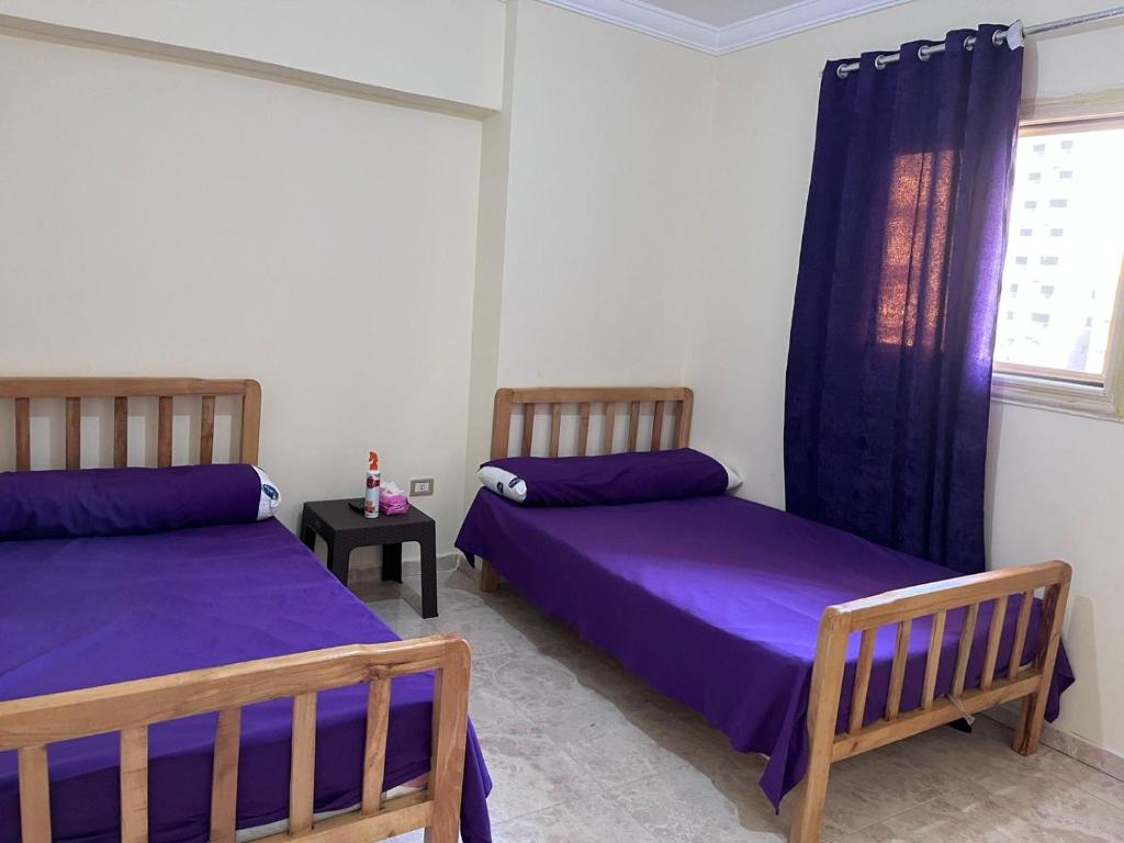 Postel nebo postele na pokoji v ubytování Taher Cairo hostel