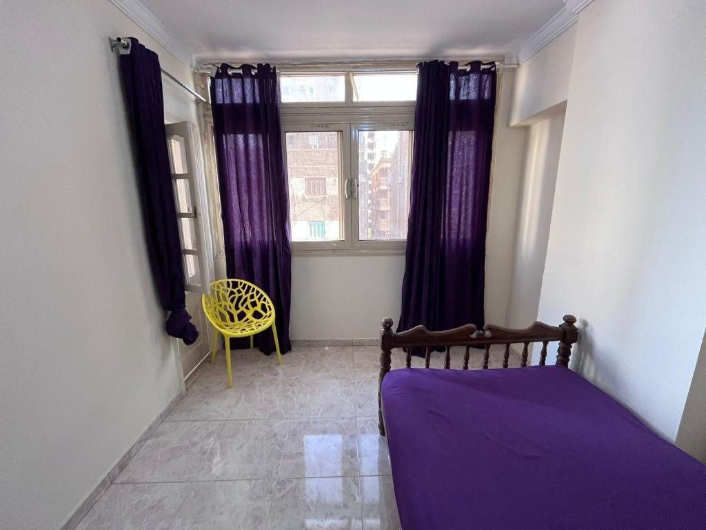 Postel nebo postele na pokoji v ubytování Taher Cairo hostel