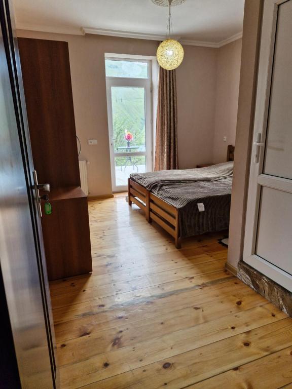 Postel nebo postele na pokoji v ubytování Maiko Guest House