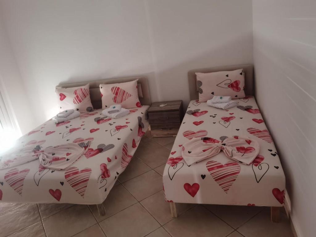 Postel nebo postele na pokoji v ubytování Apartments Luana