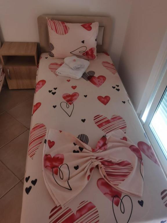 Postel nebo postele na pokoji v ubytování Apartments Luana