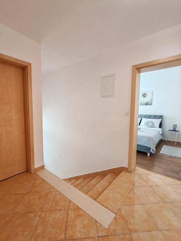 Postel nebo postele na pokoji v ubytování Apartments Amare