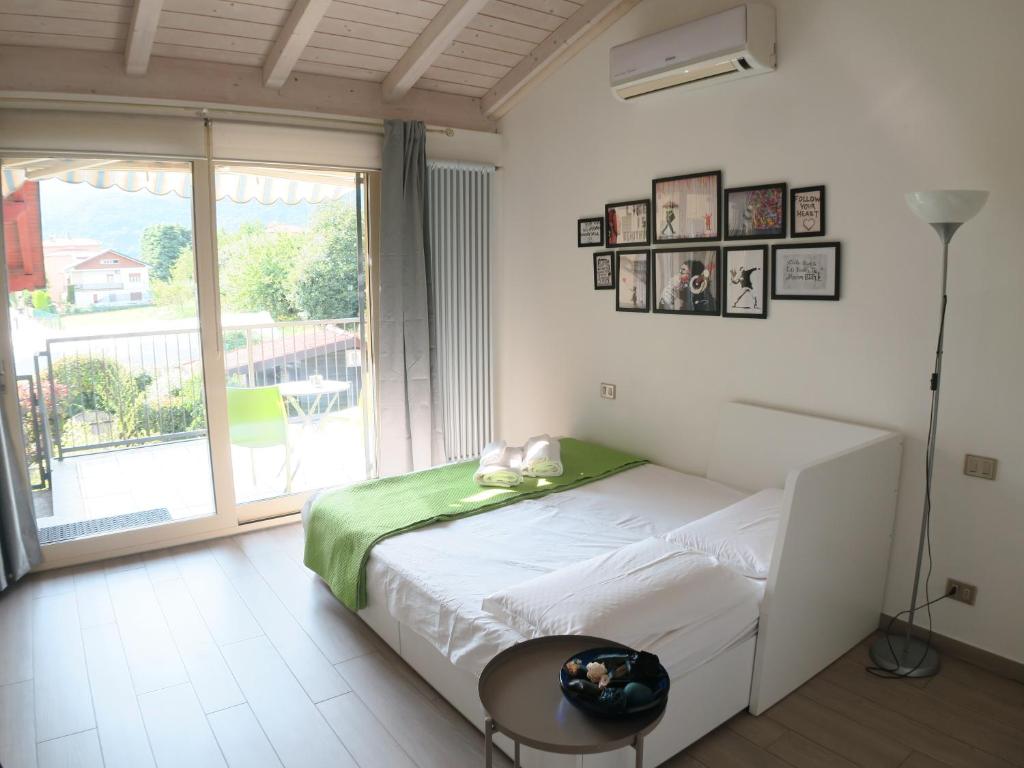 Postel nebo postele na pokoji v ubytování A Nest 4 Family