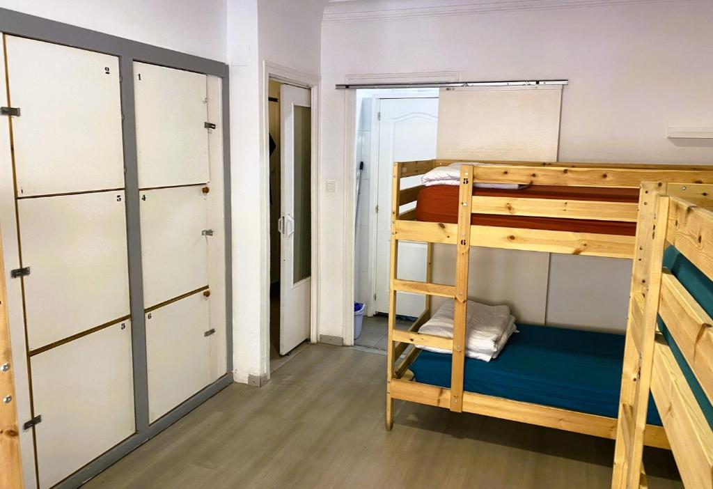 Postel nebo postele na pokoji v ubytování Alberg Els Andes