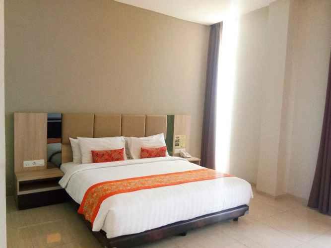 Postel nebo postele na pokoji v ubytování Moscato Hotel