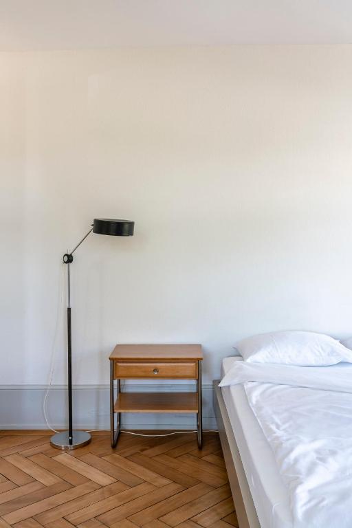 Postel nebo postele na pokoji v ubytování Militärkantine St. Gallen