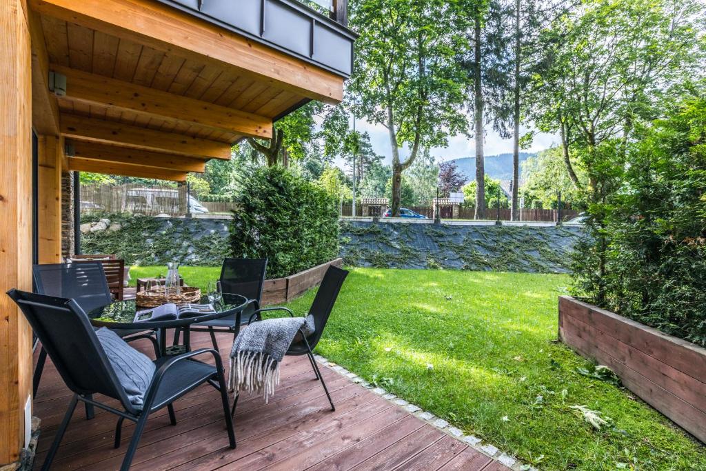 Vonkajšia záhrada v ubytovaní Apartamenty Royal Resort Spa