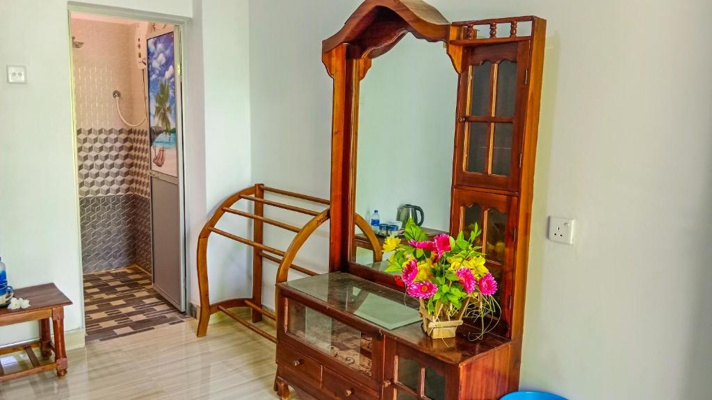 Postel nebo postele na pokoji v ubytování Gimhana Homestay