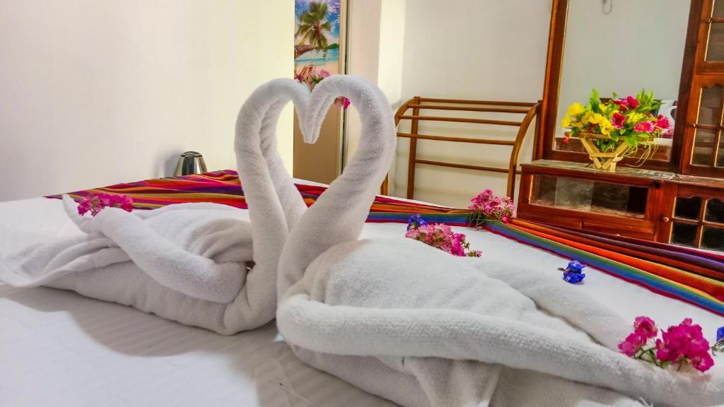 Postel nebo postele na pokoji v ubytování Gimhana Homestay