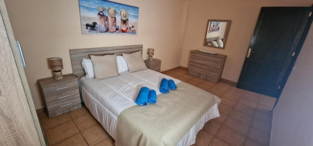 A bed or beds in a room at Apartamento vacacional Fuerteventura 1A