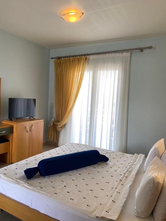 Postel nebo postele na pokoji v ubytování Zeus Paradise Hotel Ammoudia