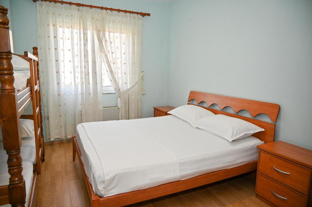 Postel nebo postele na pokoji v ubytování Hotel Vila Emes