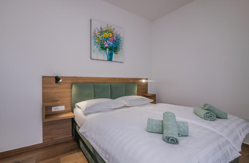 Postel nebo postele na pokoji v ubytování B&B Šegulja